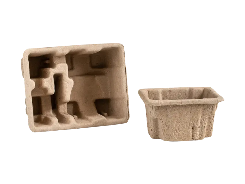 Schutz-Polstersysteme Faserformplatten: Two molded pulp packaging inserts, one with custom molded compartments.