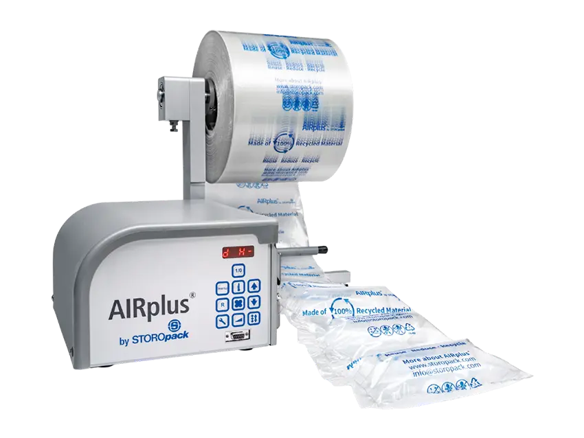 AIRplus Mini Speed Luftpolstermaschine: Luftkissensystem für Schutz-Polstersysteme. Maschine mit Luftkissenrolle und befüllten Luftpolstern.